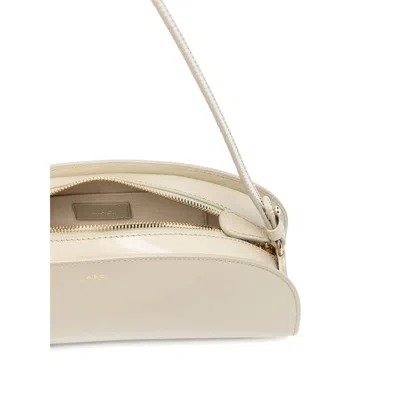 Apc Adjustable-strap Half-moon Shoulder Bag In Neutral
