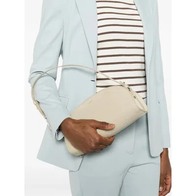 Apc Adjustable-strap Half-moon Shoulder Bag In Neutral