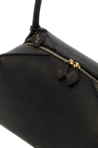 Alaïa Le Bouledogue Bowling Shoulder Bag In Nubuck Leather In Black