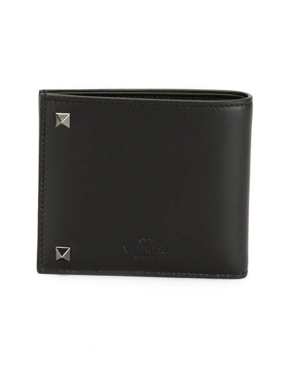 Shop Valentino Rockstud Bi-fold Wallet In Black