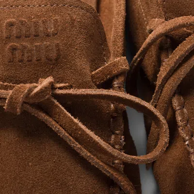 Miu Miu Suede Sabots Rounded Toe Bow Detail In Brown