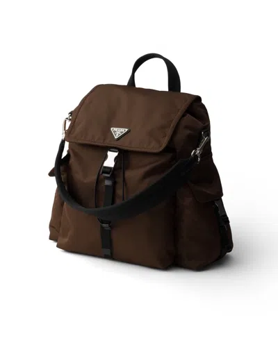 Prada Explore Rucksack Aus Re-nylon Und Leder In Brown