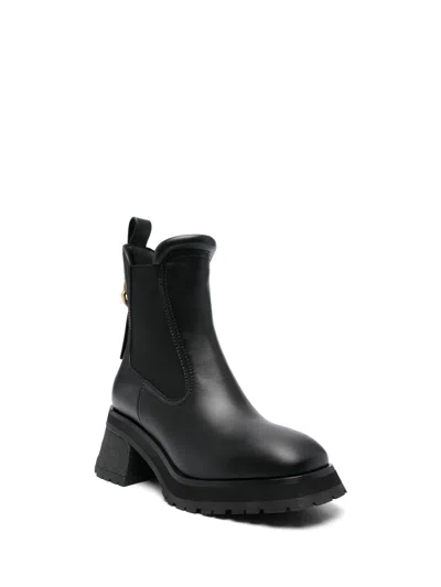 Moncler Gigi Embellished Leather Chelsea Boots In Black