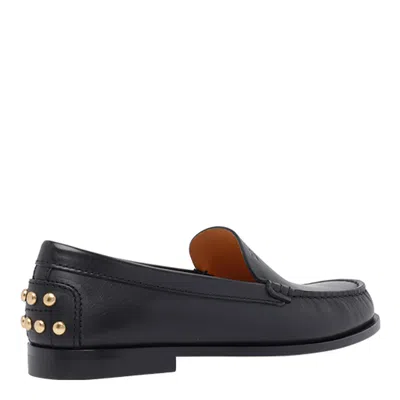 Tod's Black Loafers With Embossed Logo And Stud Details On The Back In Leather Woman