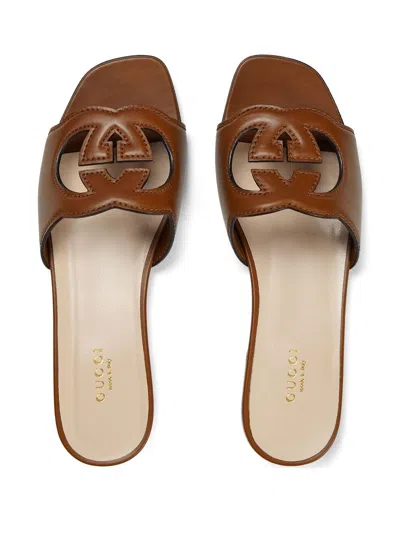 Gucci Interlocking G Cutout Leather Sandal In Brown