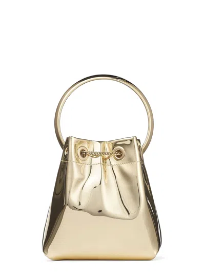 Jimmy Choo Shiny Mirror-effect Bon Bon Bag With Chain Drawstring And Metal Handle In Gold