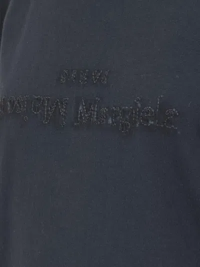 Maison Margiela Elevated Black T-shirt With Distressed Detailing And Signature Logo