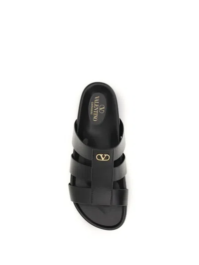 Valentino Garavani Studshield Logo-embellished Leather Sandals In Black