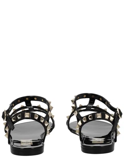 Valentino Garavani Rockstud Rubber Sandals Ankle Strap Design In Black