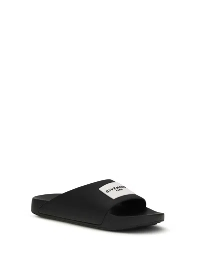 Givenchy Contoured Footbed Logo Slipper For Women In Black