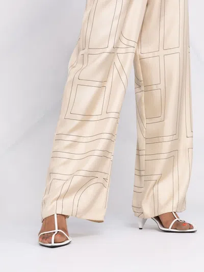 Totême Monogram Silk Straight-leg Ankle Pajama Pants In Brown