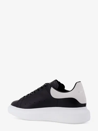 Alexander Mcqueen Black Low Top Sneakers With Logo Lettering On The Tongue In Leather Man