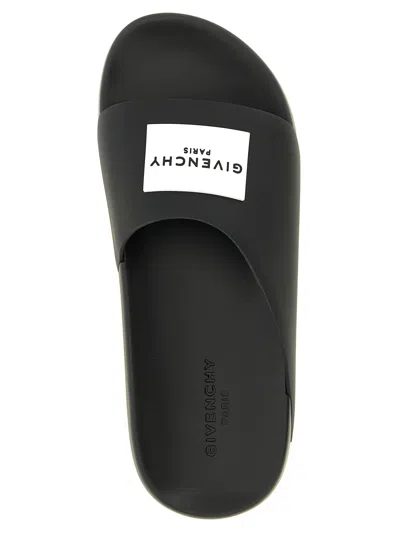 Givenchy Contoured Footbed Logo Slipper For Women In Black