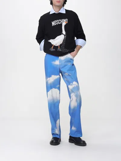Moschino Cloud-print Jeans In Blue