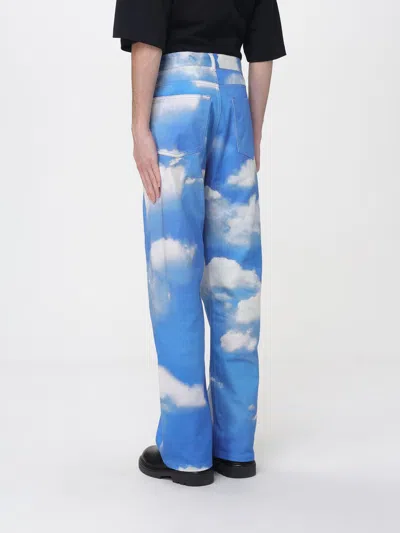 Moschino Cloud-print Jeans In Blue
