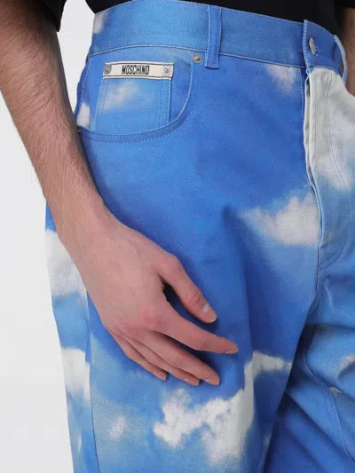 Moschino Cloud-print Jeans In Blue