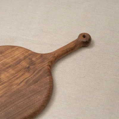 Pare Serving Board In Brown