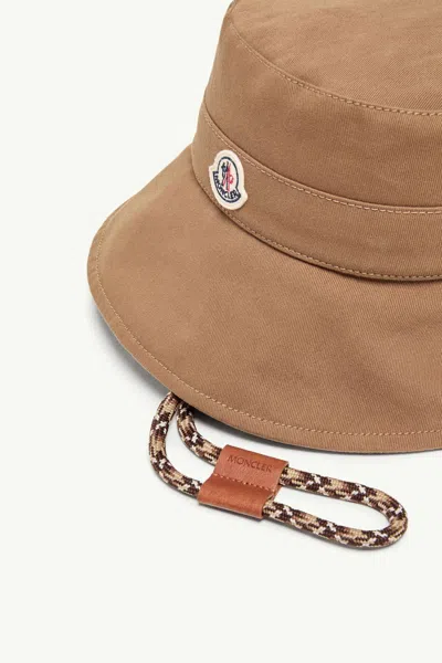 Moncler Logo Patch Drawstring Bucket Hat In Brown