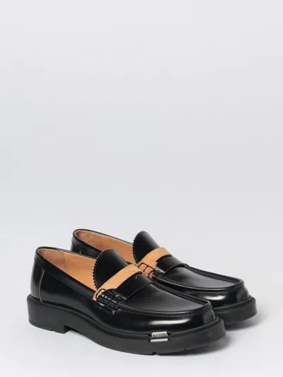 Maison Margiela Sophisticated Loafers For Men In Black