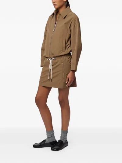 Apparis Ada Rain Jacket In Brown