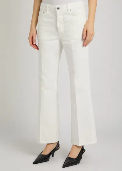 Totême Toteme Kick Flared-leg Denim Jeans In White