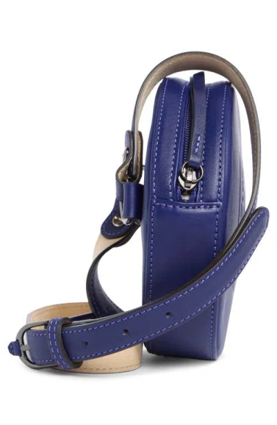 Longchamp Embossed Circular Belt Bag In Blue