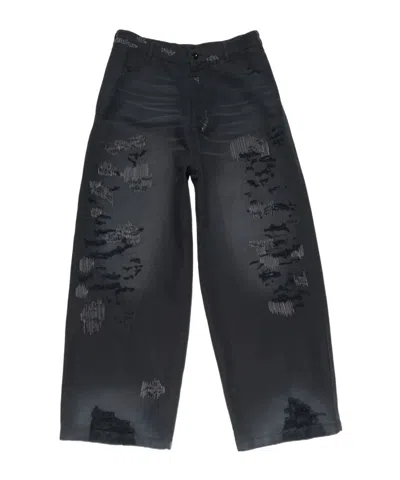 Acne Studios Mended Distressed Trousers In Black