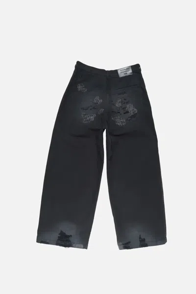 Acne Studios Mended Distressed Trousers In Black