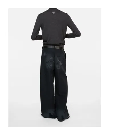 Acne Studios Mended Distressed Trousers In Black