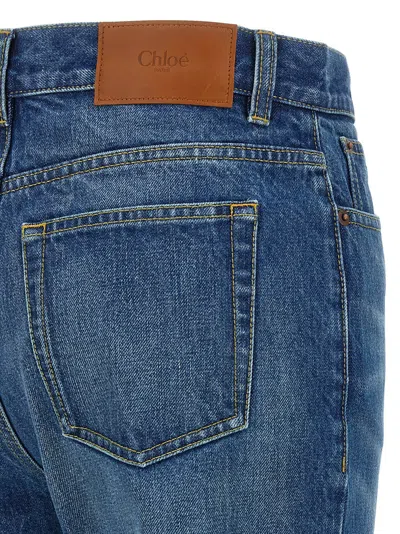 Chloé Women Blue Jeans With Wide Leg And Pendant Charm On The Front In Denim Woman In Blue