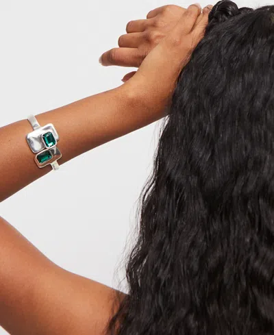 Unode50 Metal Alloy Bracelet Plated In Sterling Silver With Green And White Faceted Crystals Duplicate In Metallic