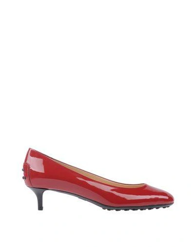 Shop Tod's Pumps In Brick Red