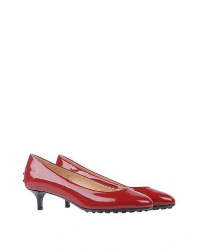 Shop Tod's Pumps In Brick Red