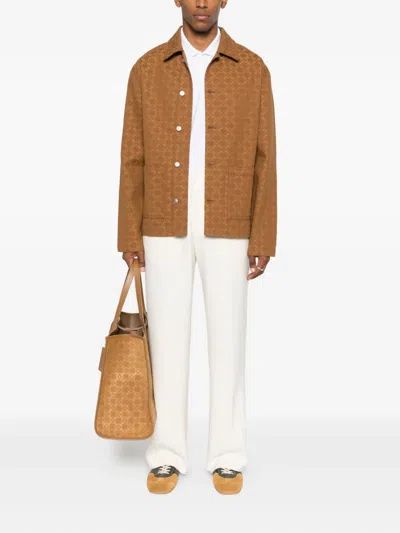 Sandro Button-up Denim Jacket In Brown