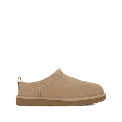 Ugg Slippers Flat Sole Pull Tab Round Toe In Brown