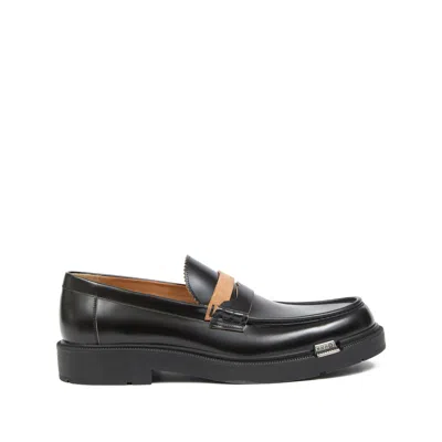 Maison Margiela Sophisticated Loafers For Men In Black