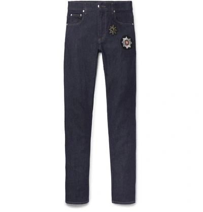 Shop Alexander Mcqueen Slim-fit Appliquéd Stretch-denim Jeans