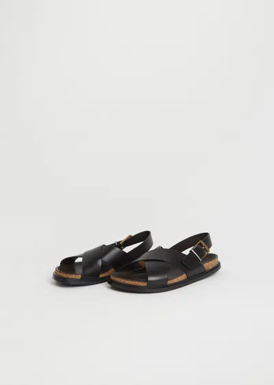 The Row Buckle Crisscross Sandal In Black