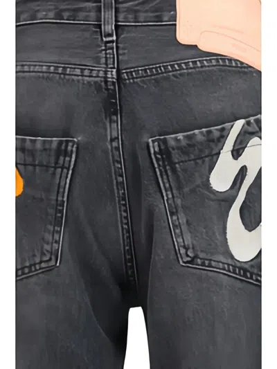 Pdf Jeans With Graphic Patches In Gray