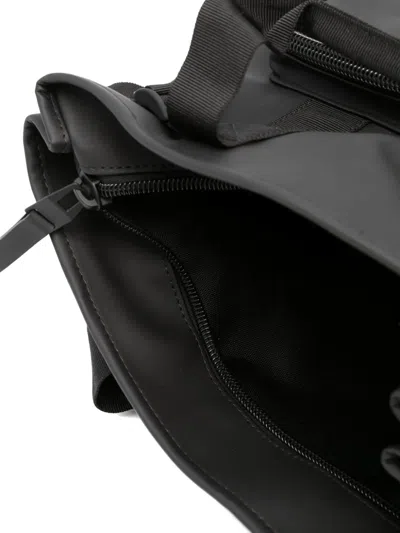 Rains Logo-print Multi-pocket Backpack In Black