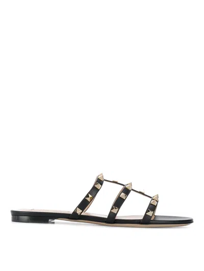 Valentino Rockstud Slide Sandal In Laminated Nappa With Cabochon In Black