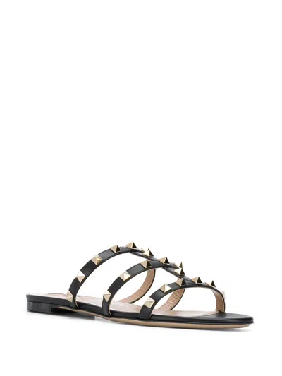 Valentino Rockstud Slide Sandal In Laminated Nappa With Cabochon In Black