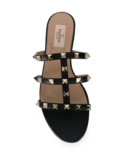 Valentino Rockstud Slide Sandal In Laminated Nappa With Cabochon In Black