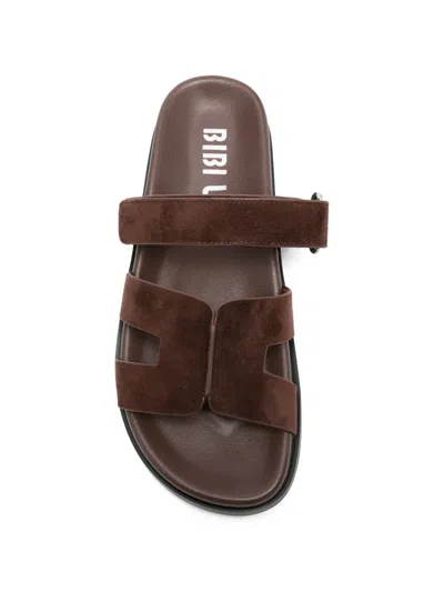 Bibi Lou Leather Flat Sandals In Brown
