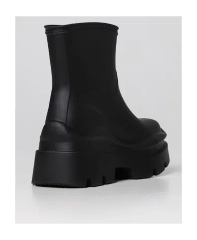 Msgm Logo-embossed Round-toe Ankle Boots In Black