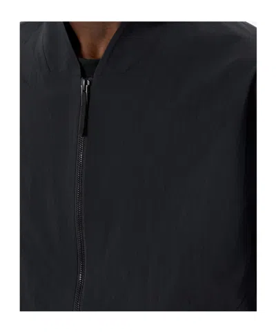 Veilance Diode Stretch Nylon Bomber Jacket In Blue