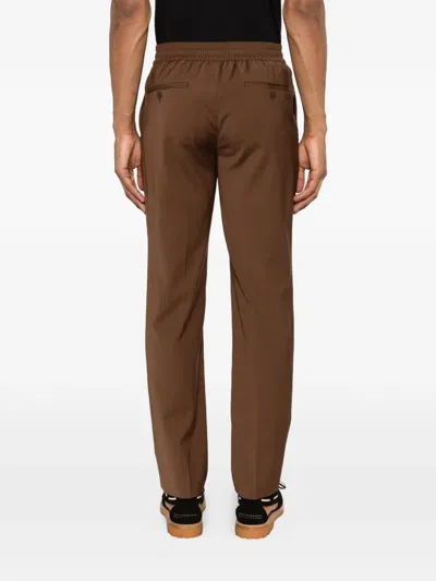 Sandro Elasticated Straight-leg Trousers In Brown