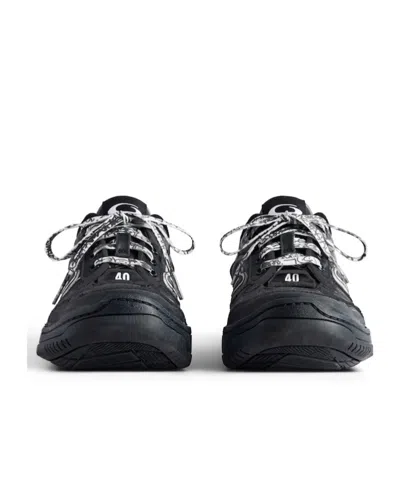 Balenciaga Hamptons Worn-out Low-top Leather Sneakers In Black