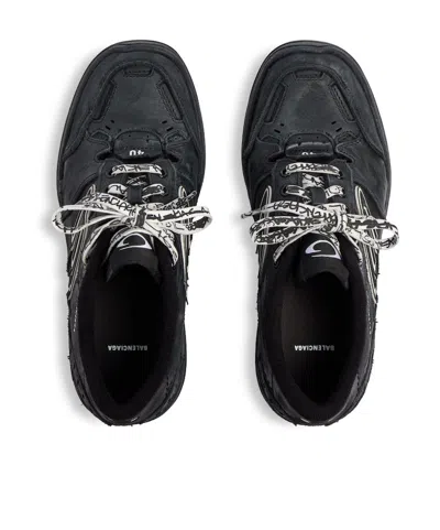 Balenciaga Hamptons Worn-out Low-top Leather Sneakers In Black