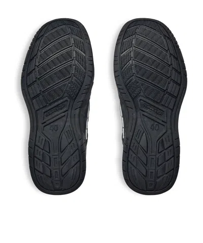 Balenciaga Hamptons Worn-out Low-top Leather Sneakers In Black